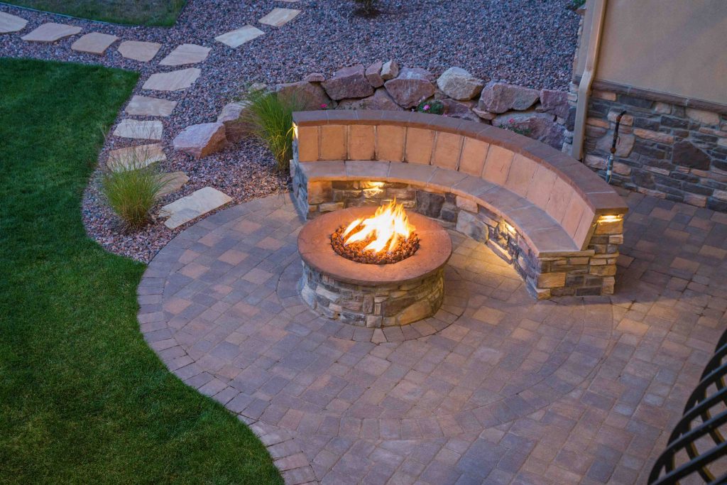 Stone fireplace with a bench
